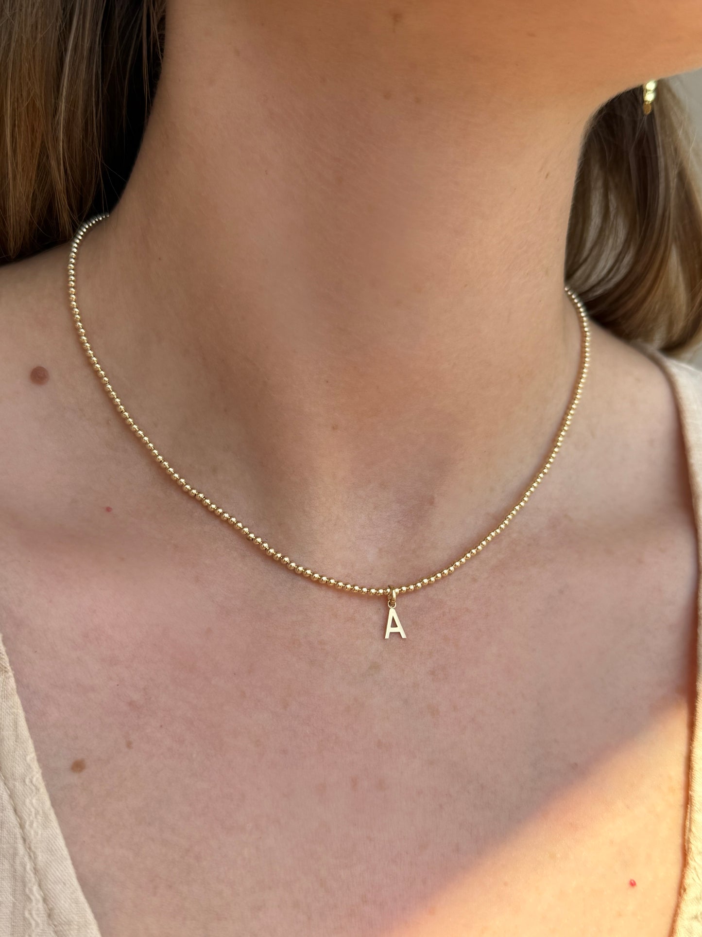 Gold Bead Initial Necklace